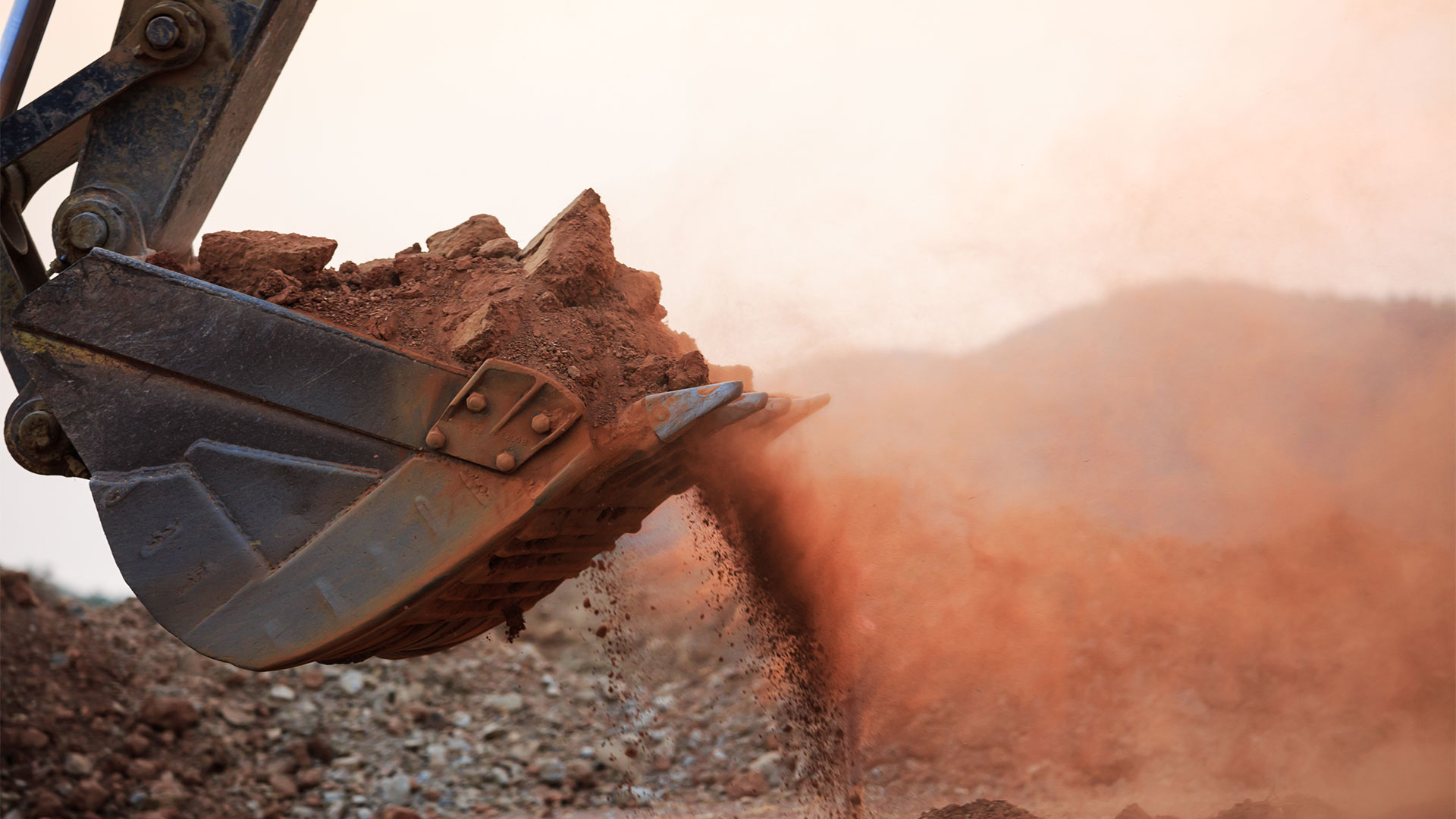 excavator collecting rocks eagle point or
